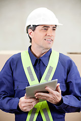 Image showing Foreman With Digital Tablet Standing in Warehouse