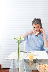 Image showing Mature Man Having Breakfast