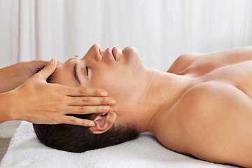 Image showing Man Receiving Head Massage At Spa