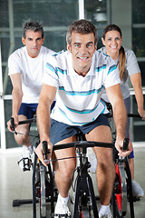 Image showing People On Exercise Bikes