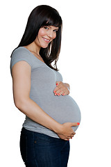 Image showing Happy Pregnant Woman With Hands On Stomach