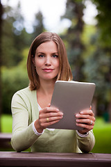 Image showing Woman with Digital Tablet Outdoors