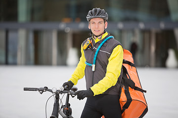 Image showing Young Male Cyclist With Courier Delivery Bag