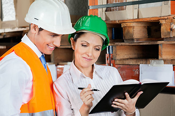 Image showing Supervisors Working At Warehouse