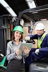 Image showing Female Supervisor And Forklift Driver With Digital Tablet