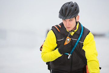 Image showing Young Courier Delivery Man Using Walkie-Talkie