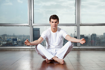 Image showing Young Man Practicing Yoga