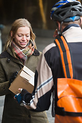 Image showing Young Woman Receiving A Package
