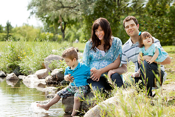 Image showing Family Portrait Near Lake