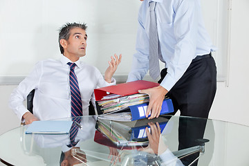 Image showing Businessmen Overwhelmed By Load Of Work