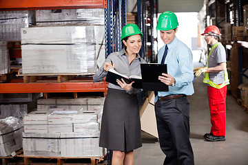 Image showing Supervisors And Foreman Working At Warehouse