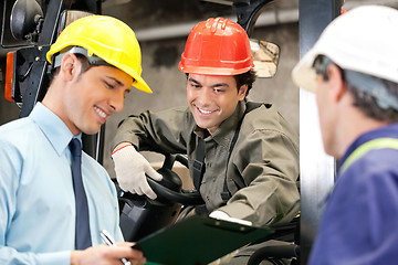 Image showing Workers And Supervisors At Warehouse