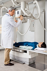 Image showing Radiologist Ready To Take X-ray Of Patient