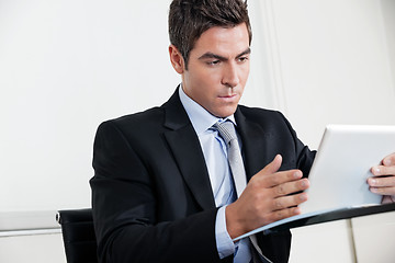 Image showing Young Businessman Using Digital Tablet