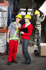 Image showing Supervisor Instructing Foreman At Warehouse