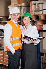 Image showing Two Young Supervisors At Warehouse