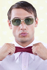 Image showing Man Adjusting Bow Tie