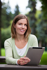 Image showing Woman holding Digital Tablet