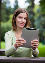 Image showing Woman in Park with Digital Tablet