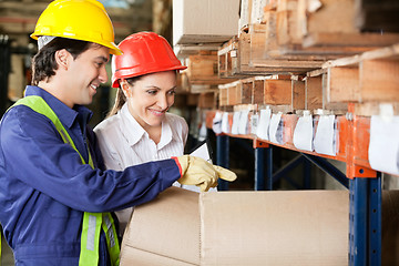 Image showing Supervisor And Foreman Checking Stock At Warehouse