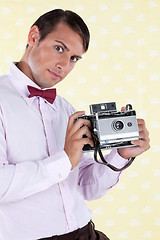 Image showing Male Holding Medium Format Camera