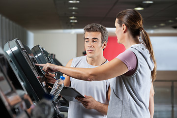 Image showing Woman Asking About Machines In Gym