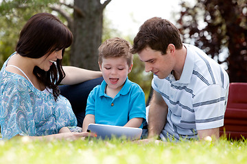 Image showing Family in Park with Digital Tablet