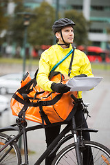 Image showing Male Cyclist With Package
