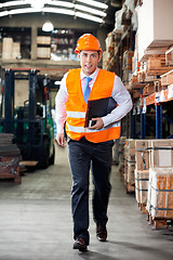 Image showing Supervisor In A Hurry At Warehouse