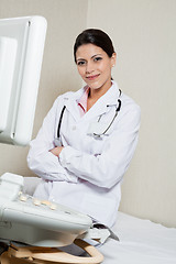 Image showing Female Radiologist Sitting Hands Folded