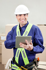 Image showing Foreman Using Digital Tablet At Warehouse