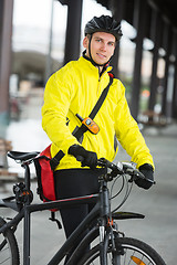 Image showing Young Male Cyclist With Bag