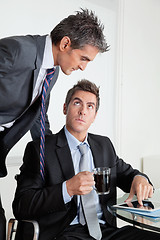 Image showing Businessman With Digital Tablet In A Meeting With Colleague