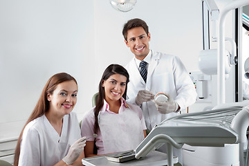 Image showing Dentist And Nurse With Patient In Clinic