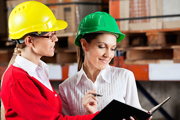 Image showing Female Supervisor And Colleague Working Together