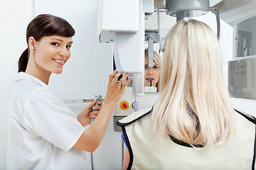 Image showing Female Dentist Getting Her Patient's Teeth X-Rayed
