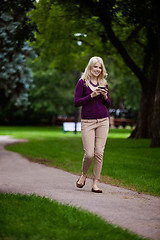 Image showing Woman Writing Text Message