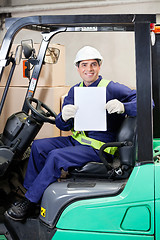 Image showing Forklift Driver Displaying Blank Placard