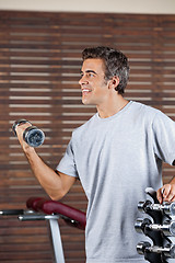 Image showing Man Lifting Dumbbell In Health Center