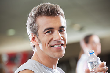 Image showing Man Holding Water Bottle In Health Club