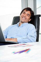 Image showing Interior Designer Using Laptop