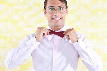 Image showing Geek Adjusting Bow Tie
