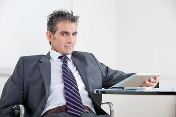 Image showing Businessman Using Digital Tablet In Office