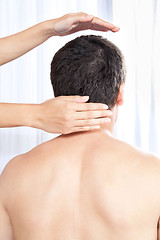 Image showing Hand Massaging Man's Head