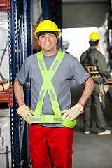 Image showing Mid Adult Foreman With Hands On Hips At Warehouse