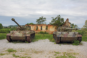 Image showing Two old tank
