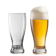 Image showing Empty and full glasses of beer isolated on white background