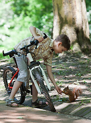 Image showing Biker with squirrel