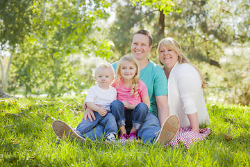 Image showing Young Attractive Family Portrait in the Park