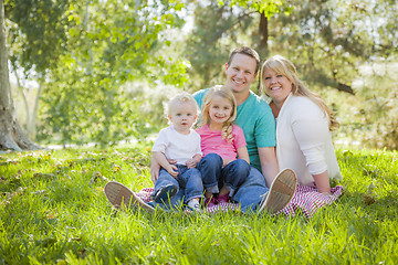 Image showing Young Attractive Family Portrait in the Park